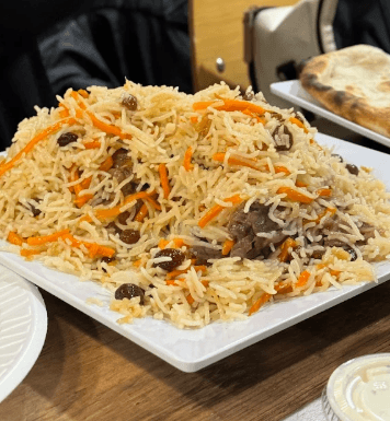 Uzbeki Palau - Traditional Rice Dish with Carrots and Raisins